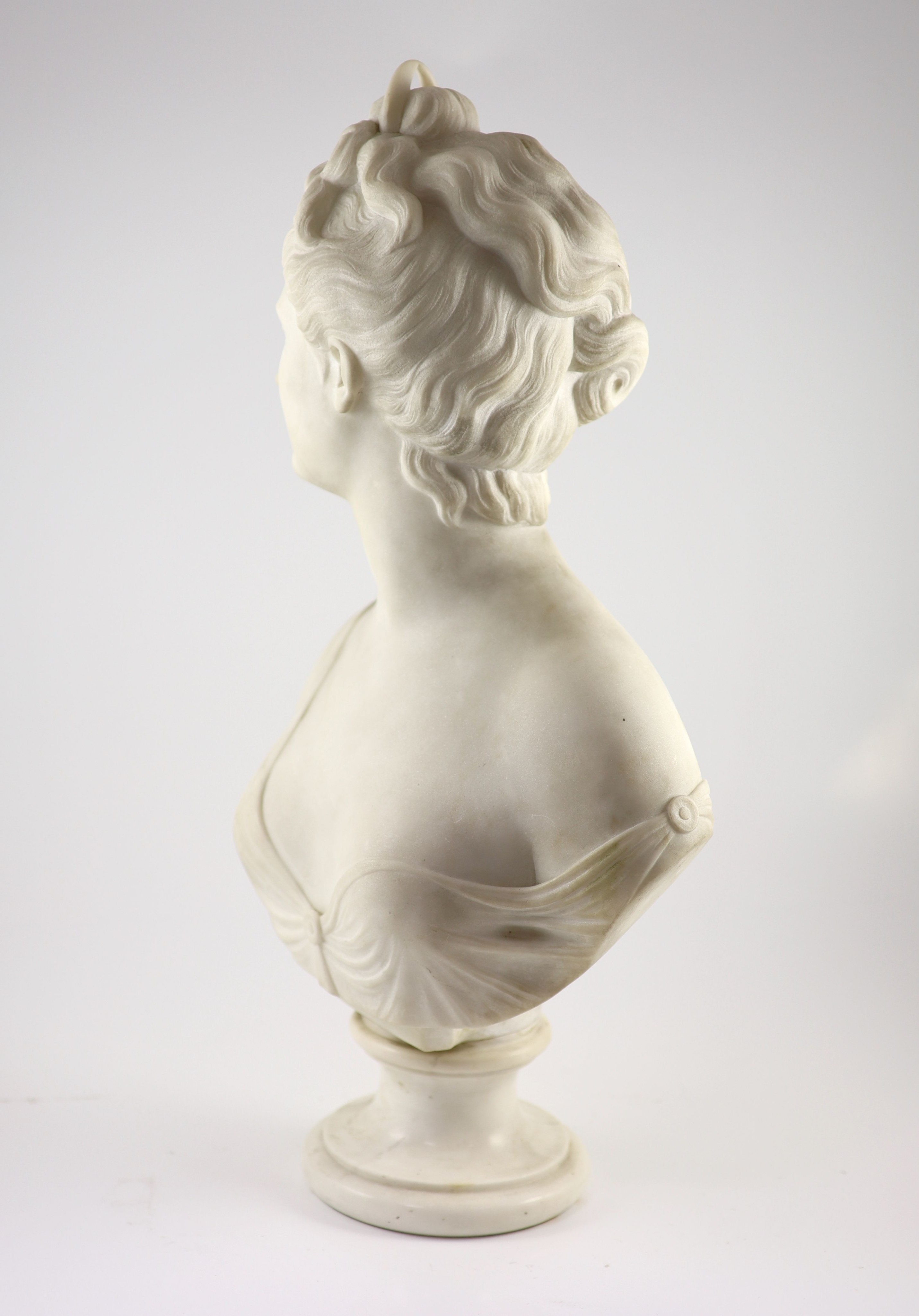 After Jean-Antoine Houdon (1786-1846), a late 19th century white marble bust of Diana the Huntress H 62cm.